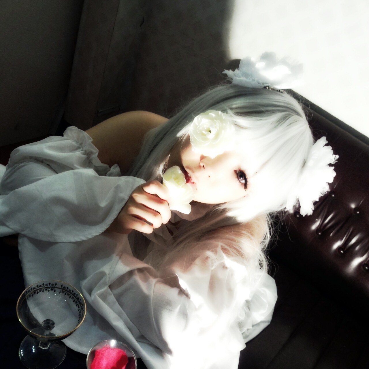 1girl bangs dress flower food holding kirakishou lips long_sleeves looking_at_viewer solo upper_body white_hair