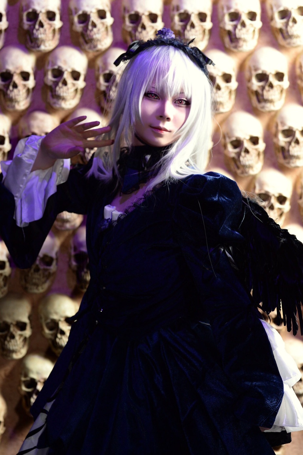 1girl 3d blurry blurry_background depth_of_field dress hairband long_hair looking_at_viewer skull solo suigintou