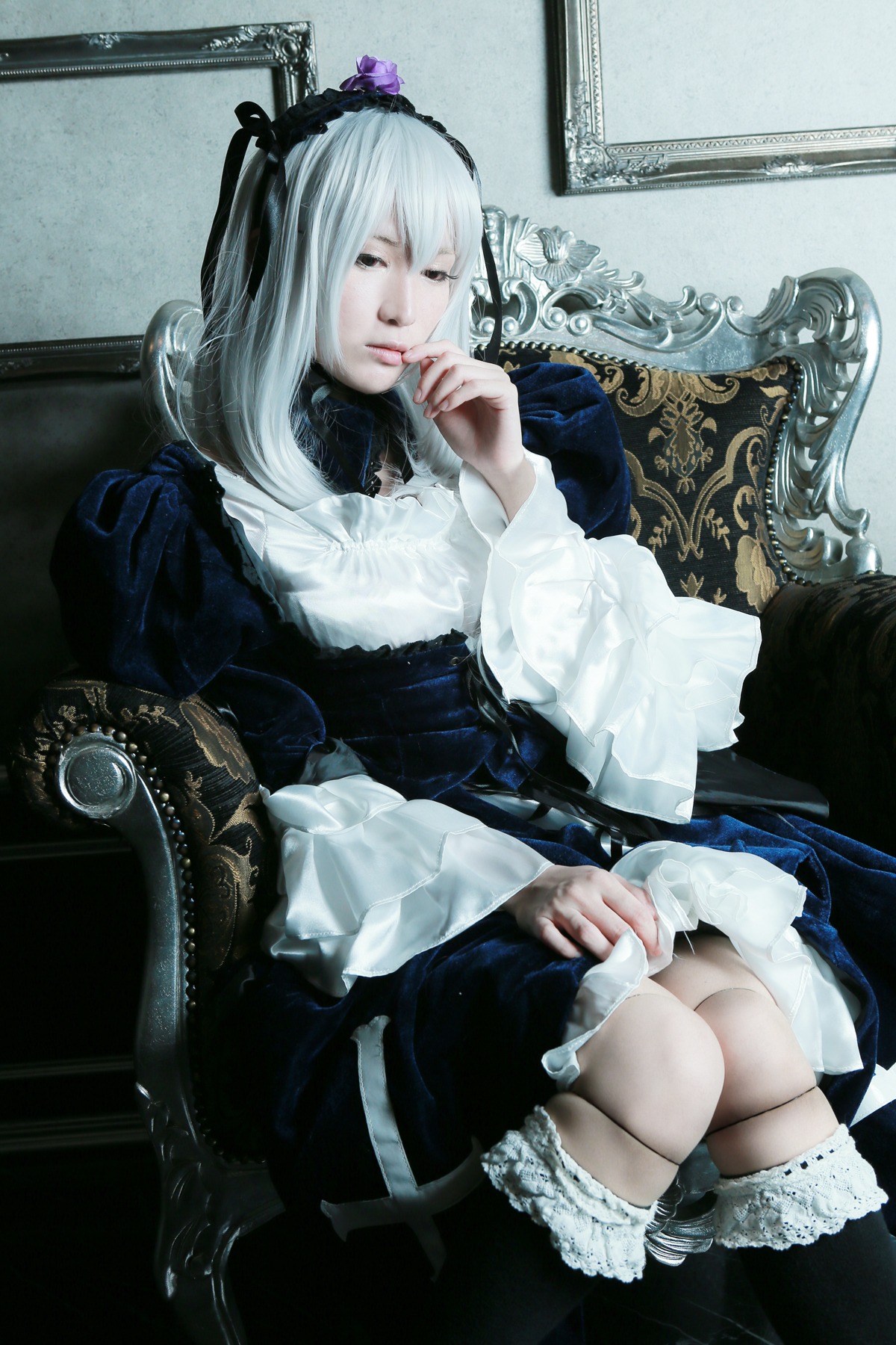 1girl chair dress frills gothic_lolita hairband lolita_fashion long_hair long_sleeves sitting solo suigintou