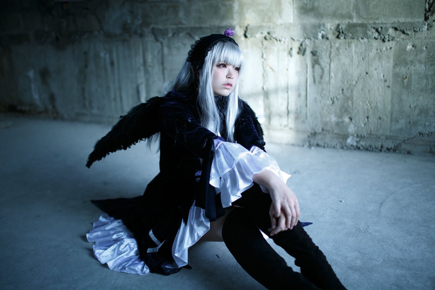 1girl bangs closed_mouth frills long_hair long_sleeves sitting solo suigintou