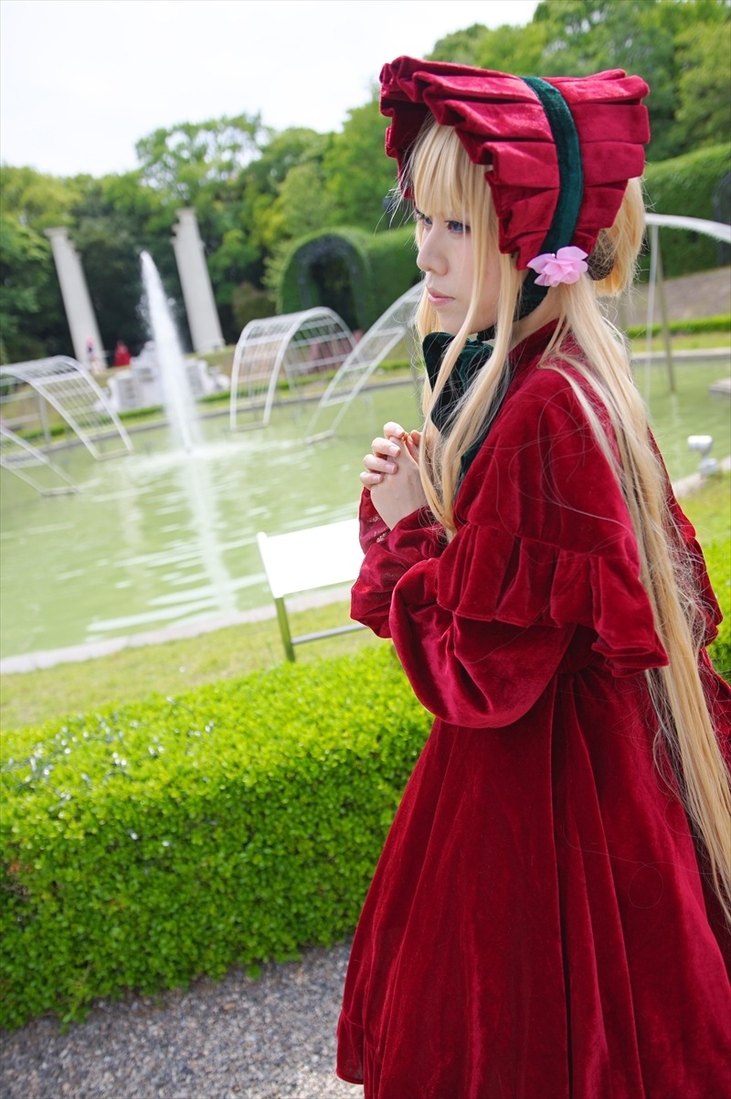 1girl bangs blonde_hair blue_eyes bonnet dress flower garden lips long_hair long_sleeves nail_polish outdoors red_dress shinku solo very_long_hair