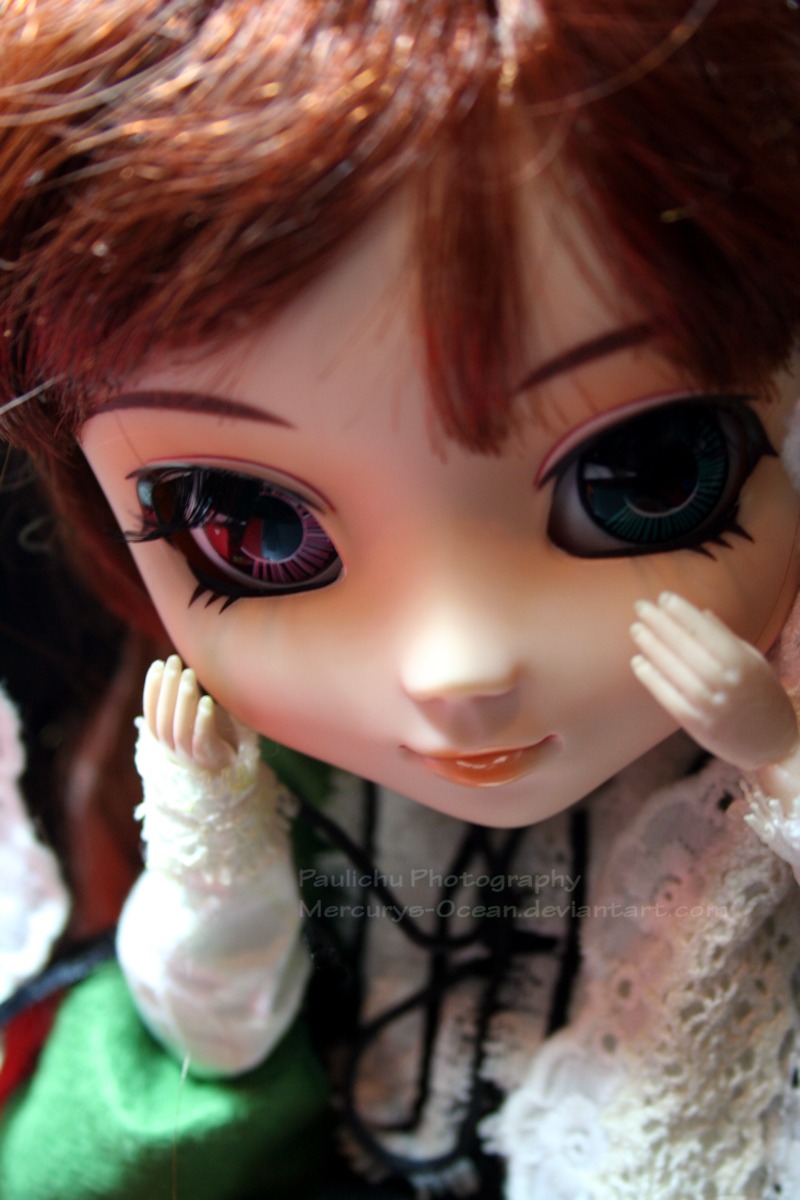 1girl blue_eyes blurry blurry_foreground close-up closed_mouth depth_of_field doll eyelashes face lips looking_at_viewer short_hair smile solo suiseiseki