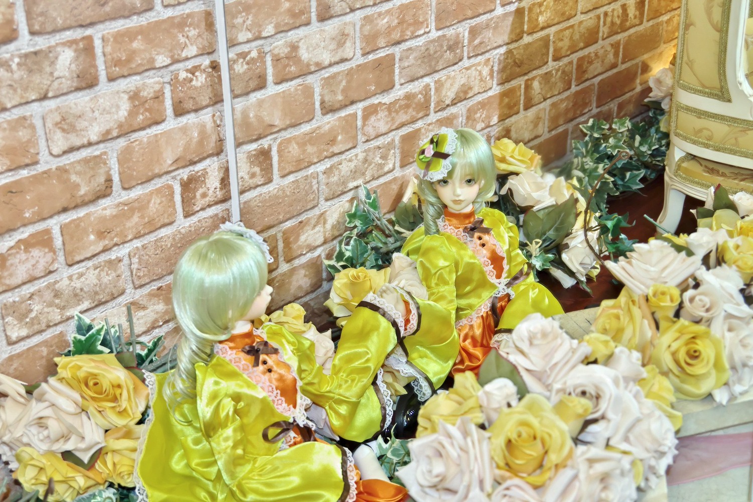 2girls blonde_hair bouquet brick_wall doll dress flower green_hair kanaria multiple_girls rose short_hair solo white_flower white_rose yellow_dress yellow_flower yellow_rose