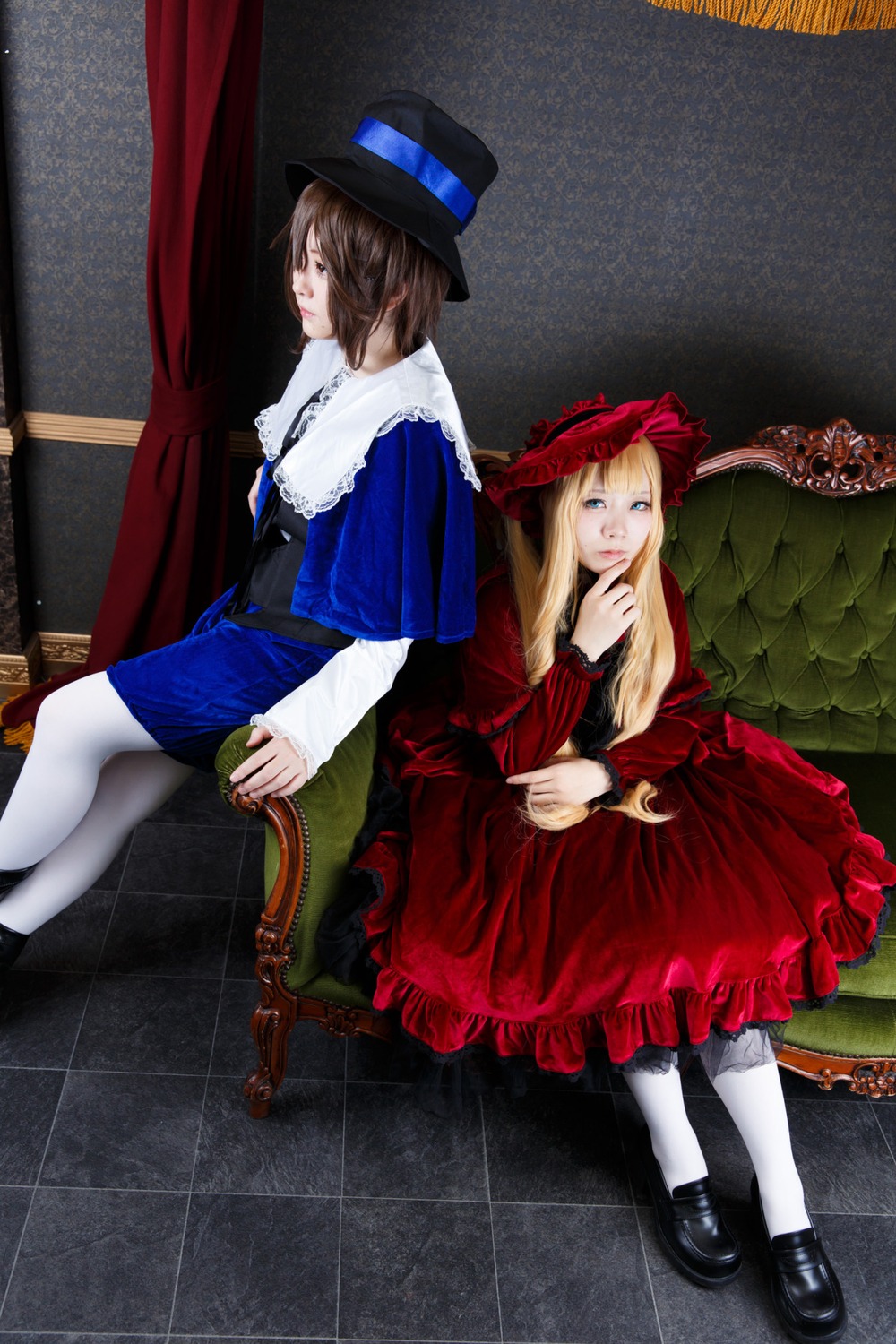 2girls blonde_hair blue_dress blue_eyes brown_hair curtains dress flower hat long_hair long_sleeves multiple_cosplay multiple_girls pantyhose red_dress ribbon shoes short_hair sitting tagme top_hat white_legwear