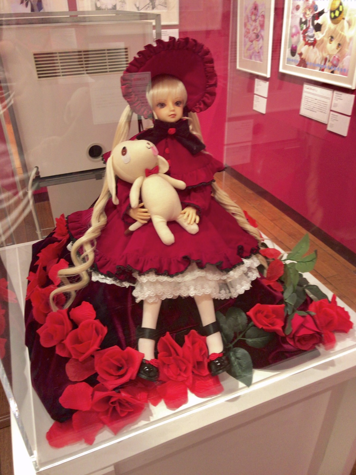 1girl blonde_hair doll dress flower red_dress red_flower red_rose rose shinku sitting solo stuffed_animal teddy_bear