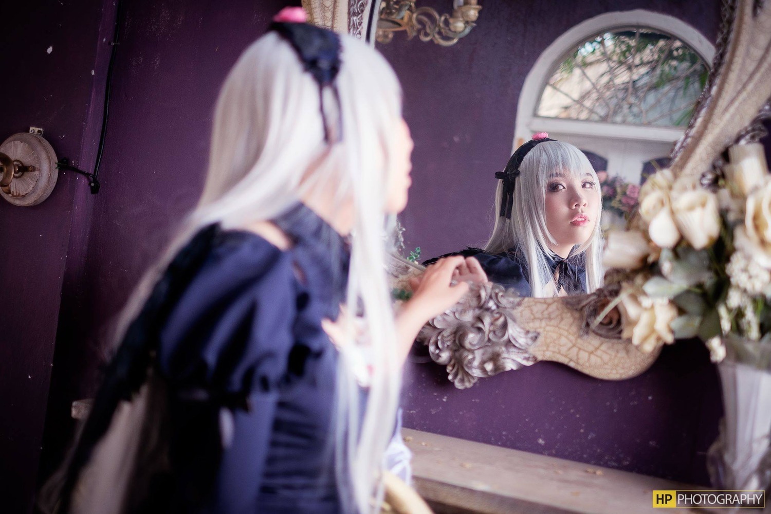 blurry blurry_background blurry_foreground depth_of_field dress flower frills indoors long_hair long_sleeves mirror photo ribbon silver_hair solo suigintou