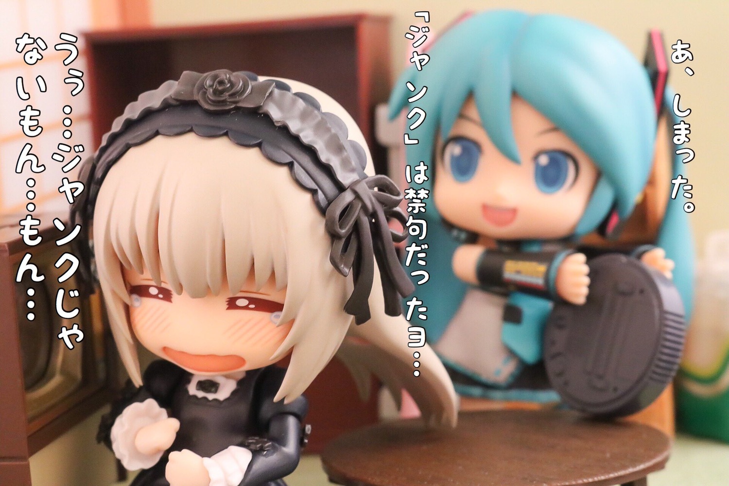 2girls blue_eyes blue_hair blurry blurry_background blurry_foreground blush chibi depth_of_field doll figure hairband lolita_fashion lolita_hairband long_hair motion_blur multiple_girls open_mouth solo suigintou