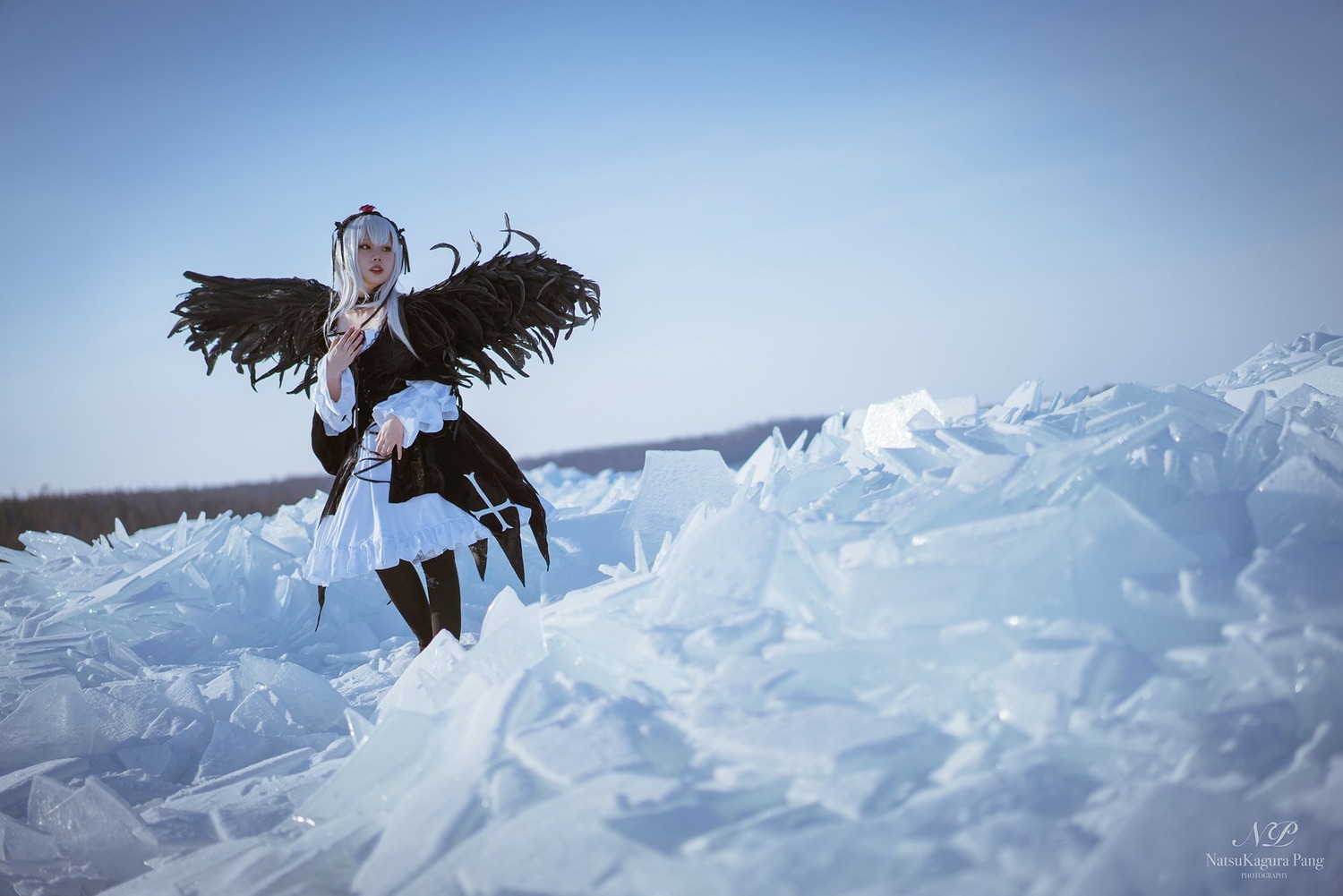 1girl artist_name black_wings blue_sky dated day feathered_wings long_hair outdoors red_eyes sky snow solo standing suigintou weapon wide_sleeves wings