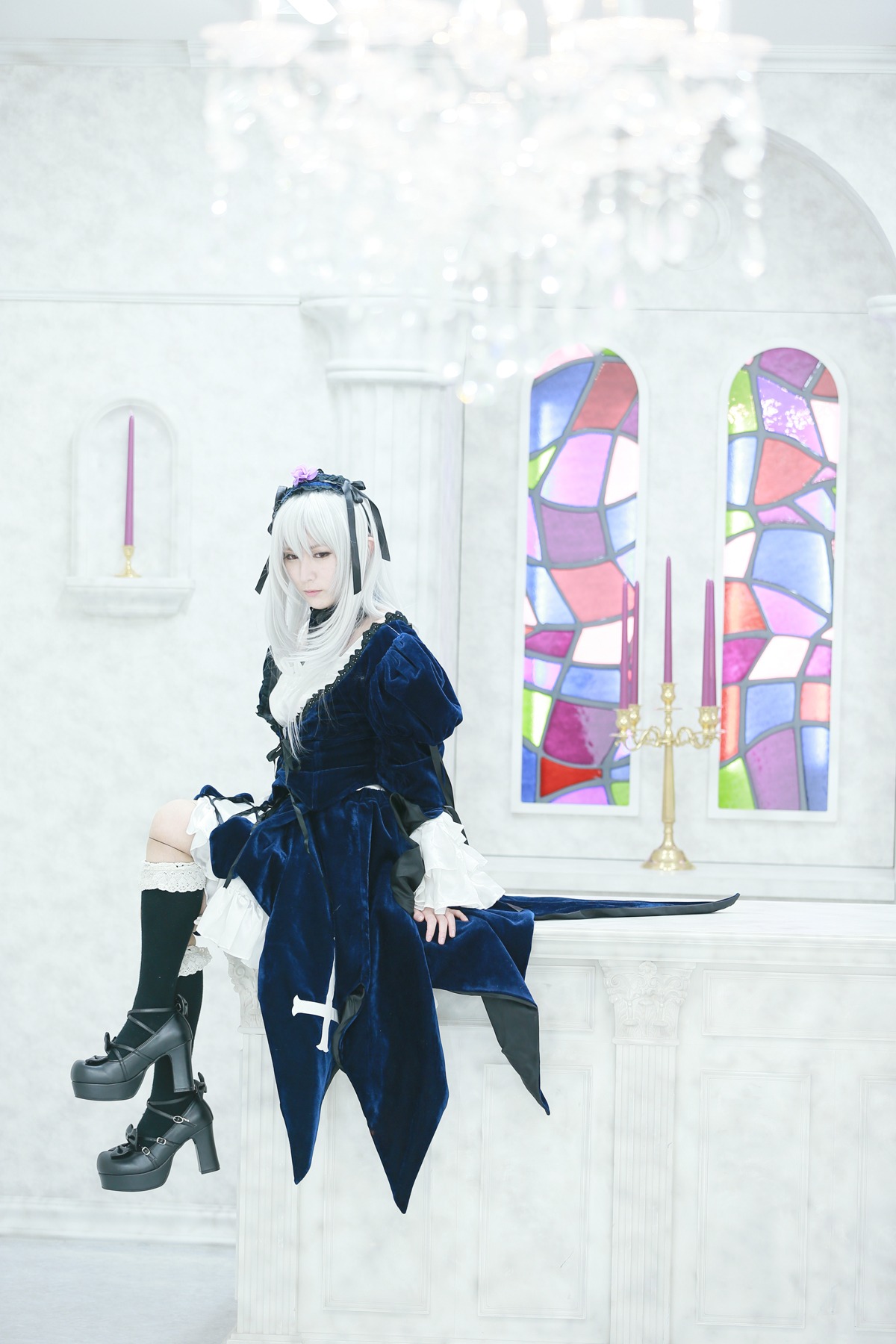 1girl black_footwear boots dress frills hairband high_heel_boots high_heels long_hair long_sleeves silver_hair sitting solo suigintou