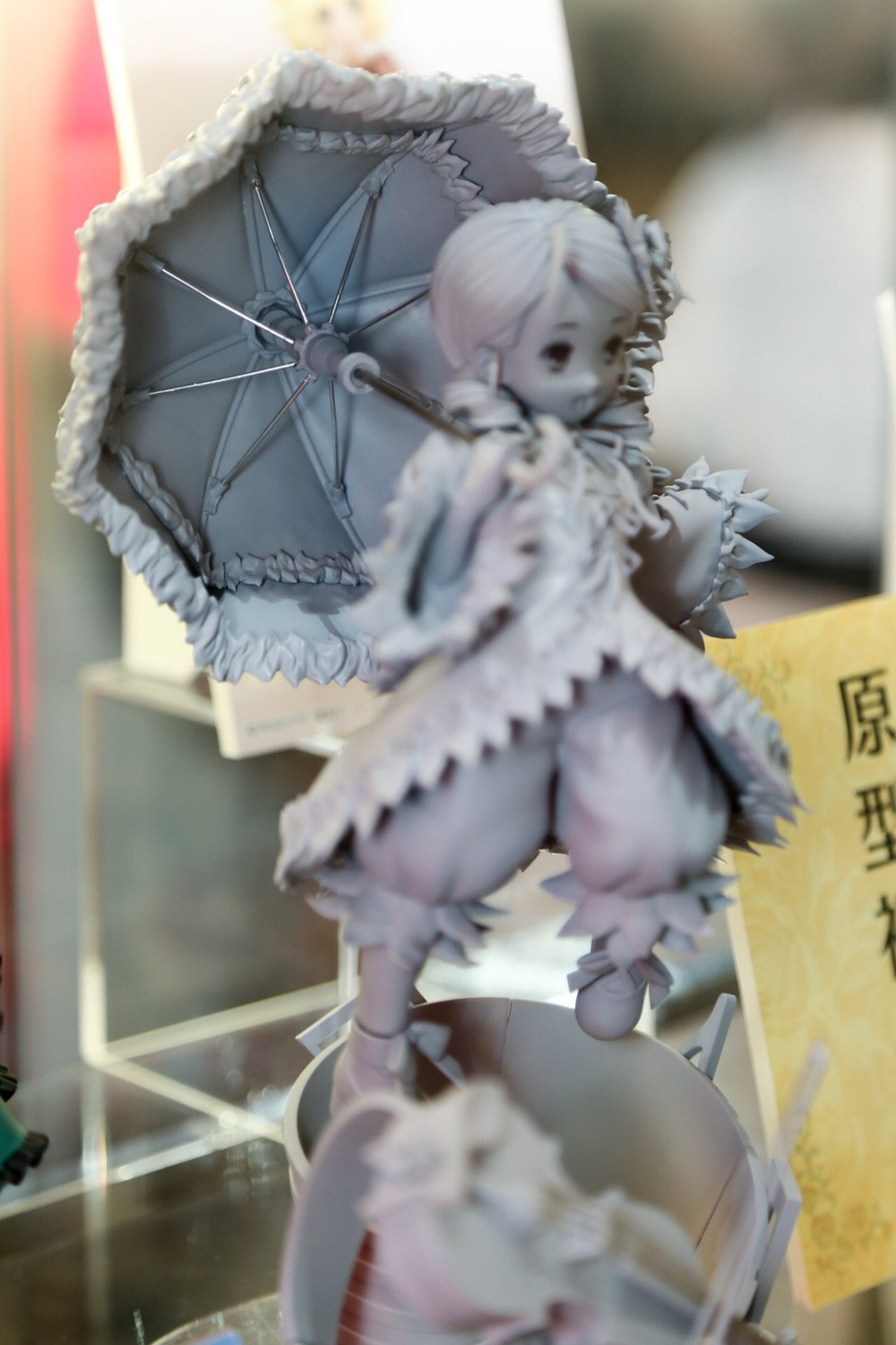 blurry blurry_background blurry_foreground chromatic_aberration depth_of_field doll dress frills kanaria motion_blur parasol photo solo umbrella wings