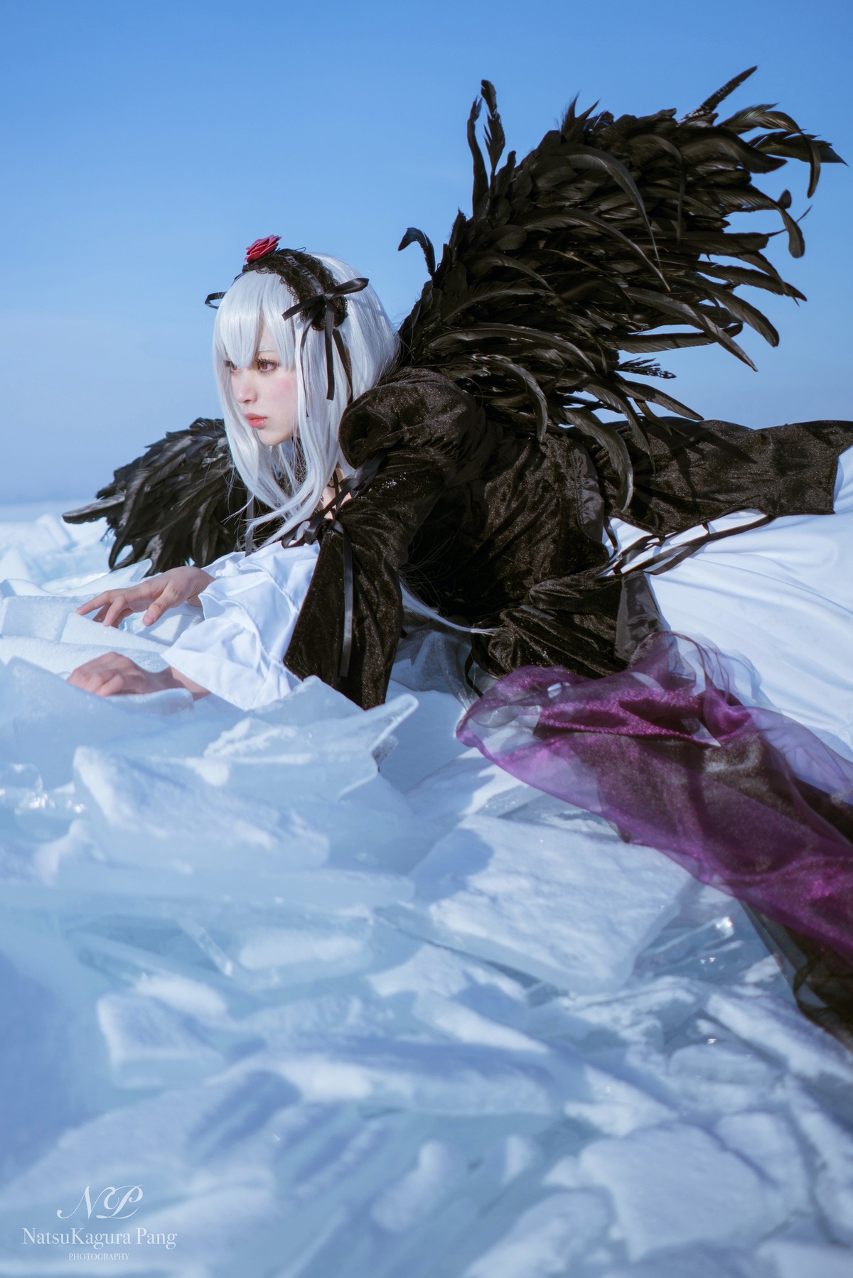 1girl black_wings blue_background dated dress long_hair long_sleeves signature snow solo suigintou wings