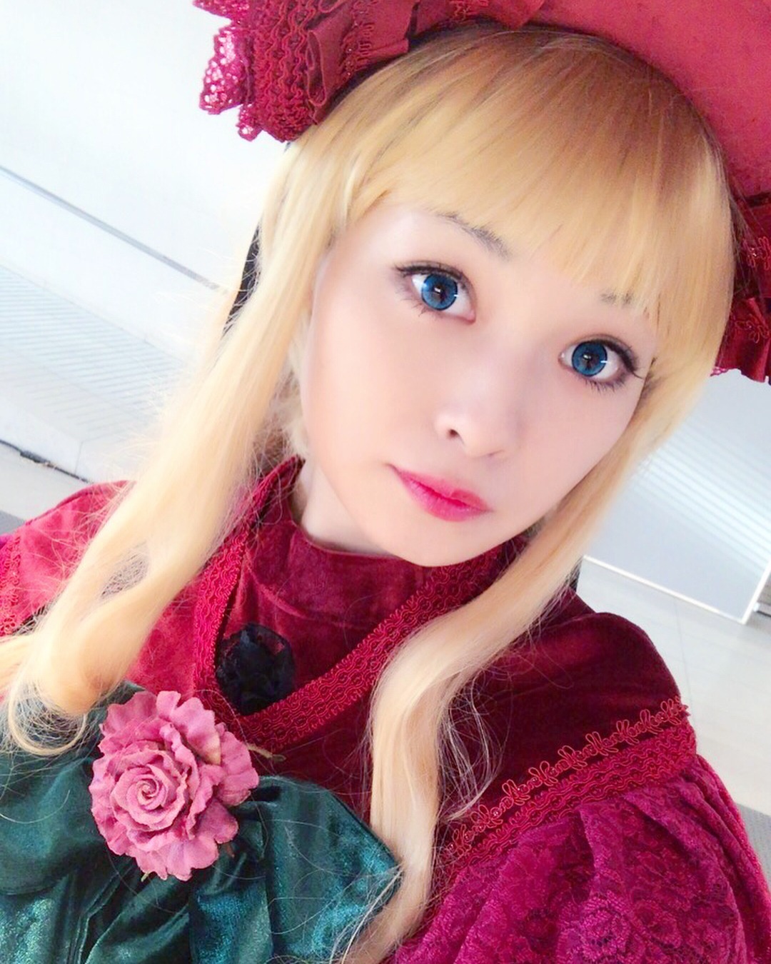 1girl bangs blonde_hair blue_eyes bow flower hat lips looking_at_viewer photo red_rose rose shinku solo upper_body