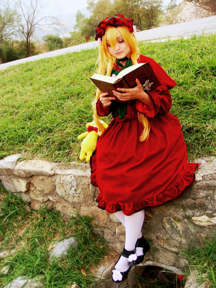 1girl blonde_hair book day dress grass holding holding_book nature outdoors red_dress shinku shoes short_hair solo tree