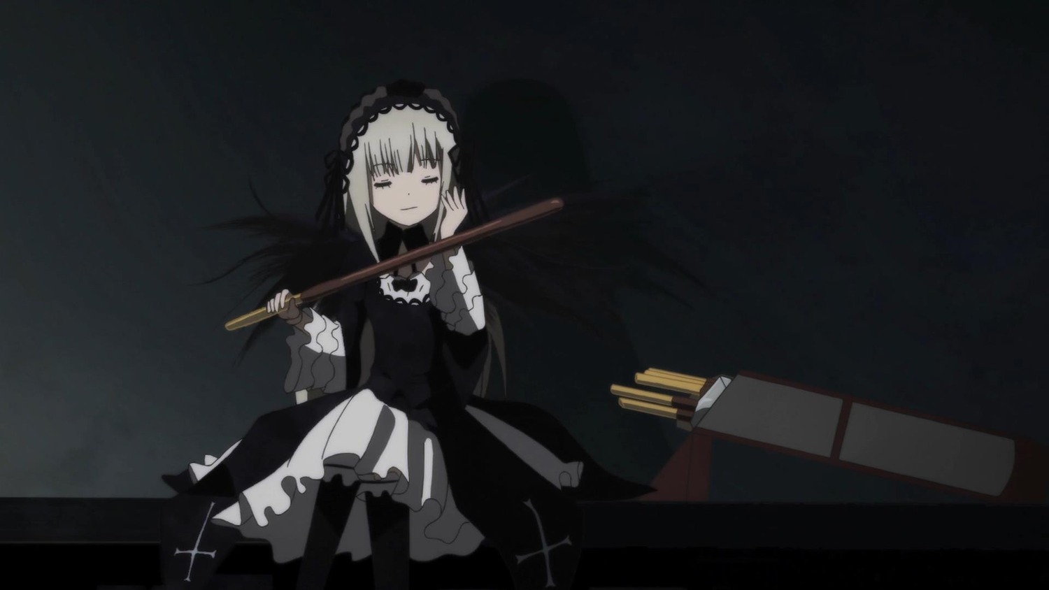 1girl black_dress boots closed_mouth cross dress frills hairband holding image long_sleeves sitting solo suigintou weapon