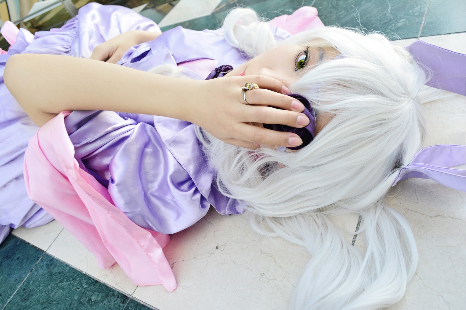 1girl animal_ears barasuishou black_hanekawa jewelry lying photo ring solo white_hair yellow_eyes