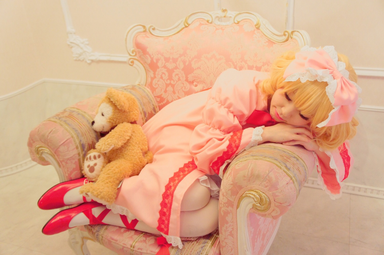 1girl blonde_hair bow closed_eyes doll dress frills hair_bow hina_ichigo hinaichigo pink_bow pink_dress sitting sleeping solo