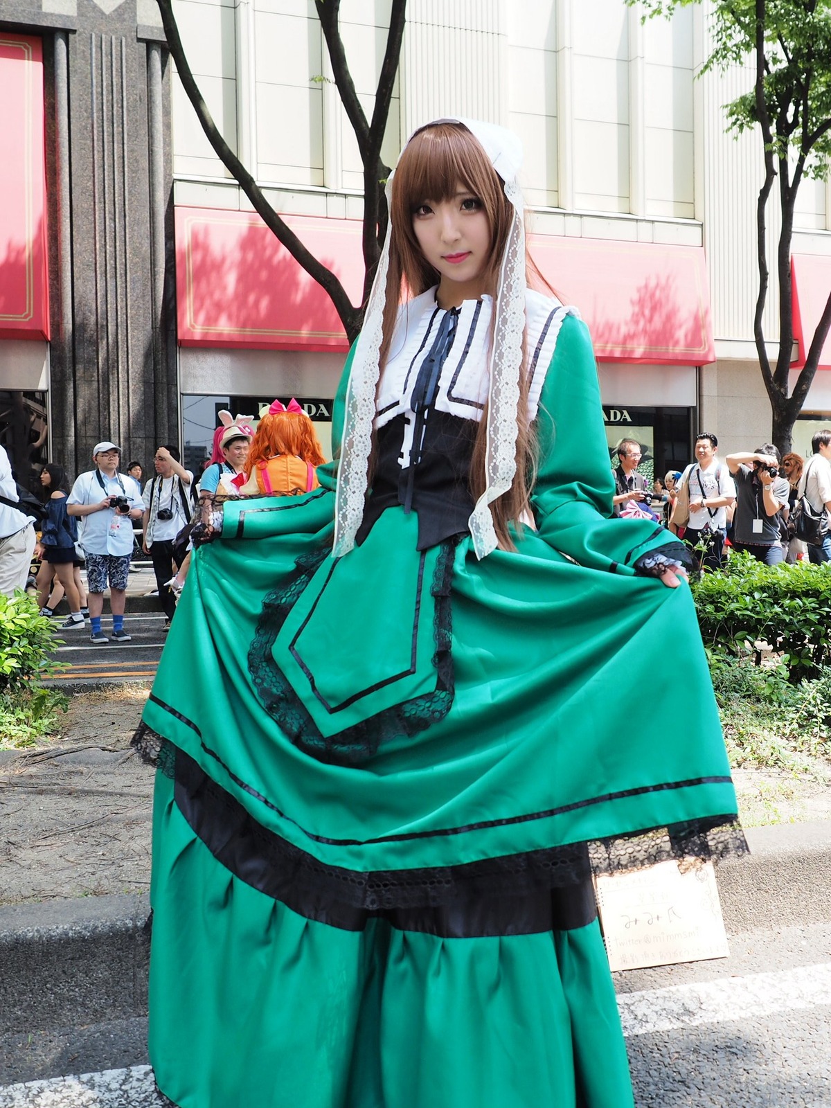 brown_hair dress green_dress long_hair looking_at_viewer multiple_boys multiple_girls necktie solo standing suiseiseki