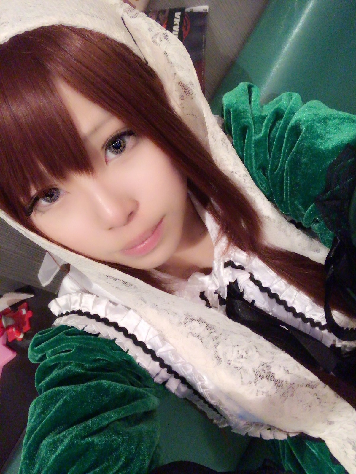 1girl bangs closed_mouth frills green_dress hood lips looking_at_viewer photo smile solo suiseiseki