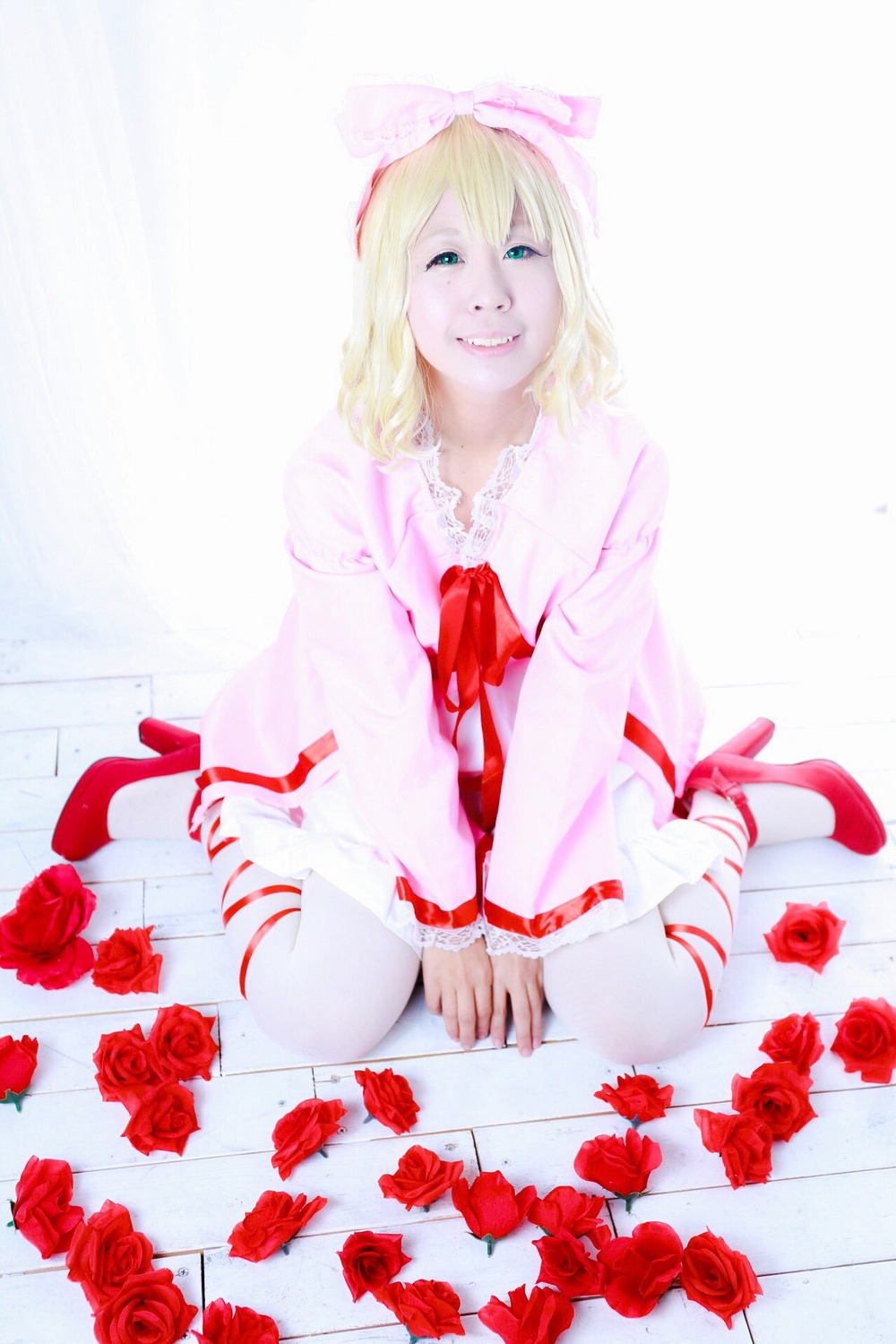 1girl blonde_hair blue_eyes flower high_heels hinaichigo lips pink_rose red_flower red_footwear red_rose rose rose_petals shoes sitting smile solo striped thorns vertical-striped_legwear vertical_stripes wariza white_rose