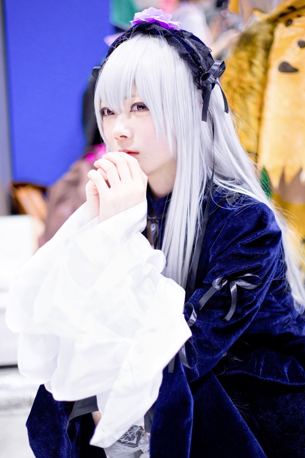 1girl 3d blurry blurry_background blurry_foreground depth_of_field dress hairband long_hair long_sleeves photo red_eyes silver_hair solo suigintou