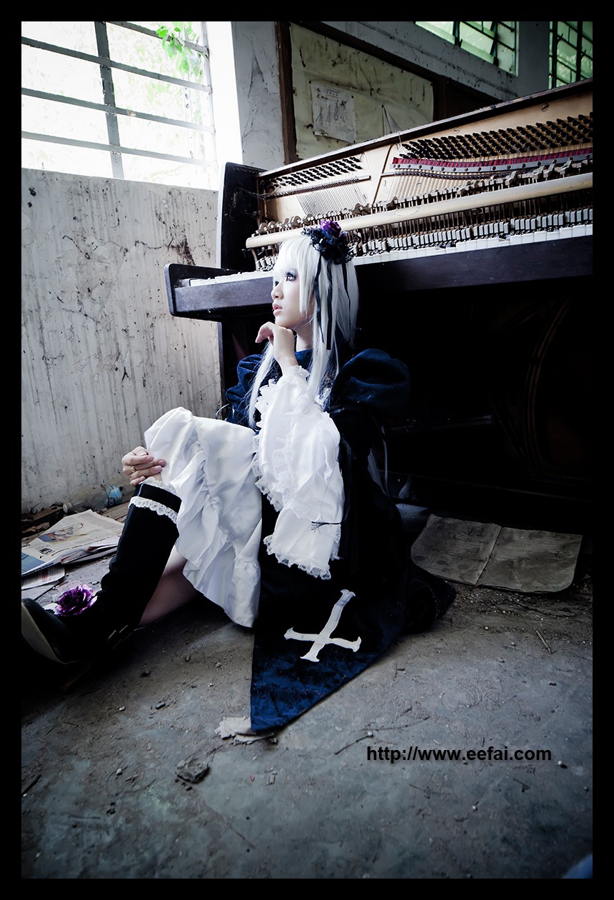 1girl dress indoors letterboxed long_hair sitting solo suigintou white_hair window