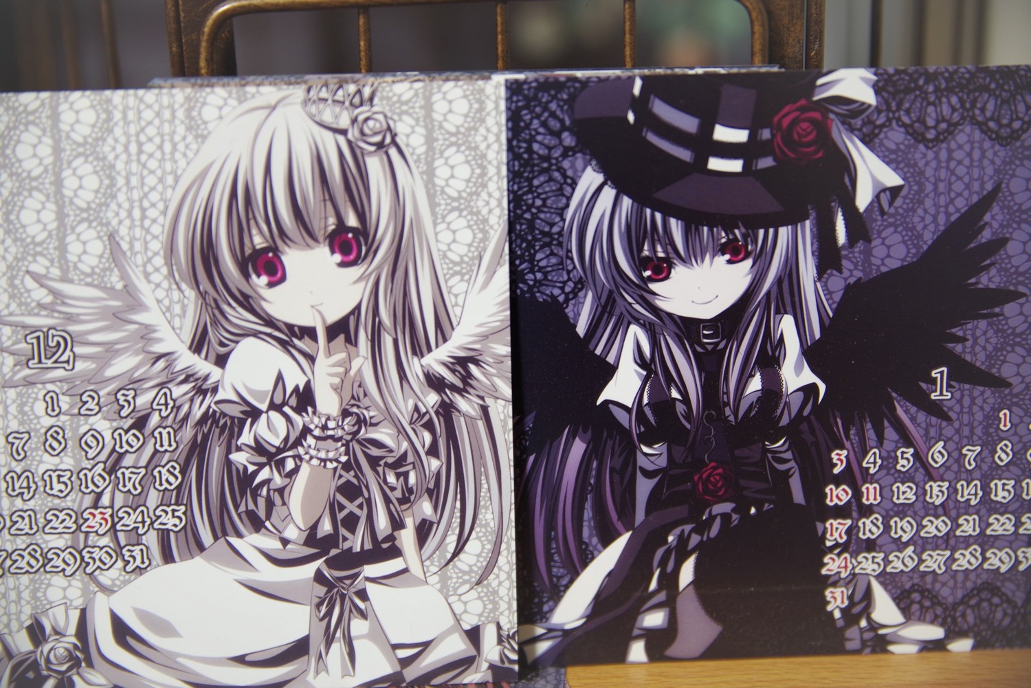 2girls angel_wings dress finger_to_mouth flower hat image long_hair multiple_girls rose smile solo suigintou wings