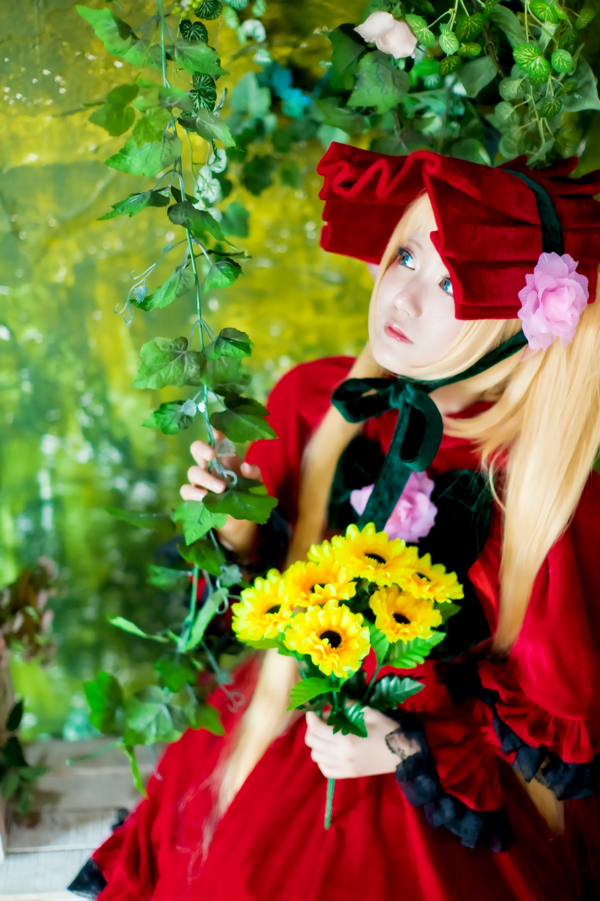 1girl blonde_hair blue_eyes blurry bonnet depth_of_field dress flower frills lips long_hair red_dress shinku solo