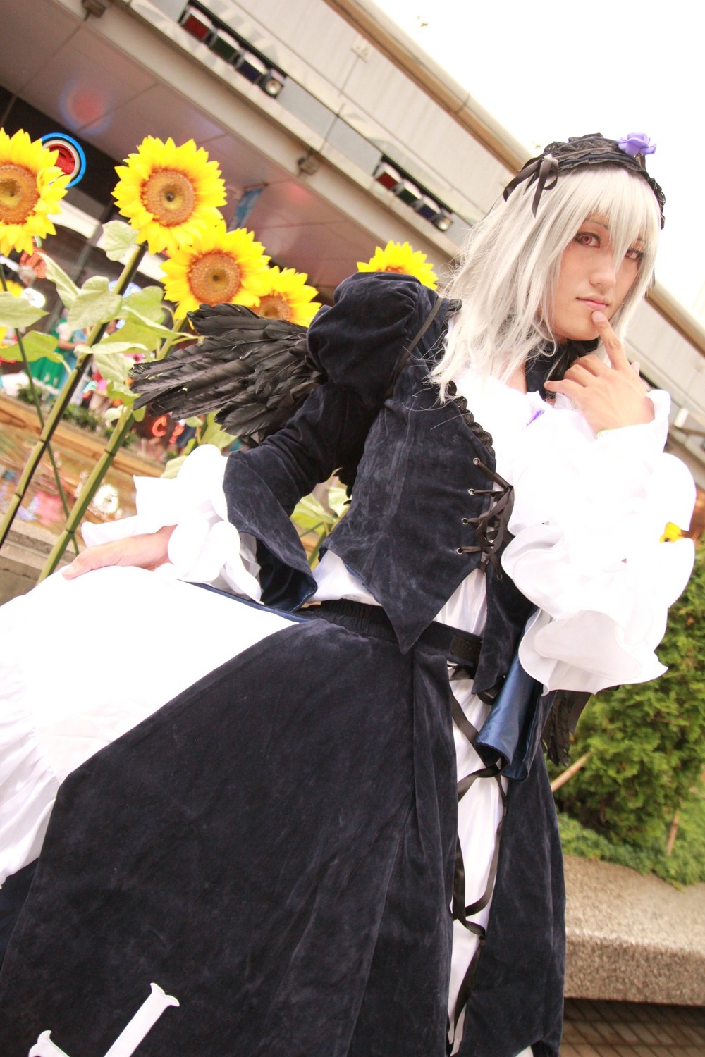 3d black_dress dress flower hairband long_sleeves looking_at_viewer photo red_eyes solo standing suigintou sunflower wings