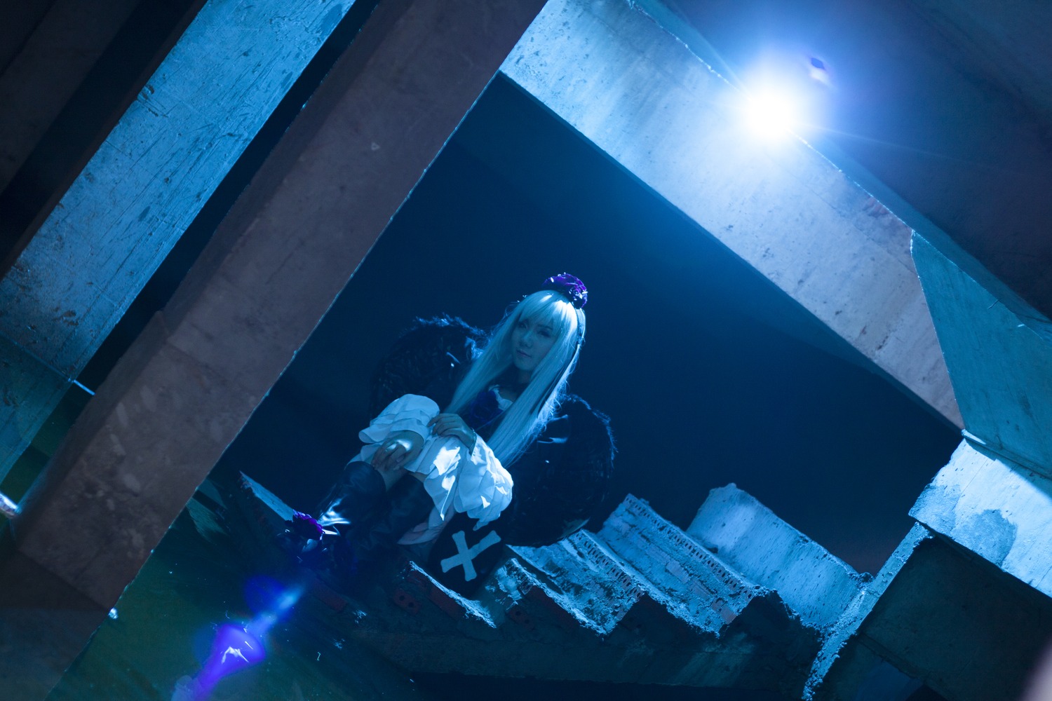 1girl blue_theme long_hair sitting solo suigintou