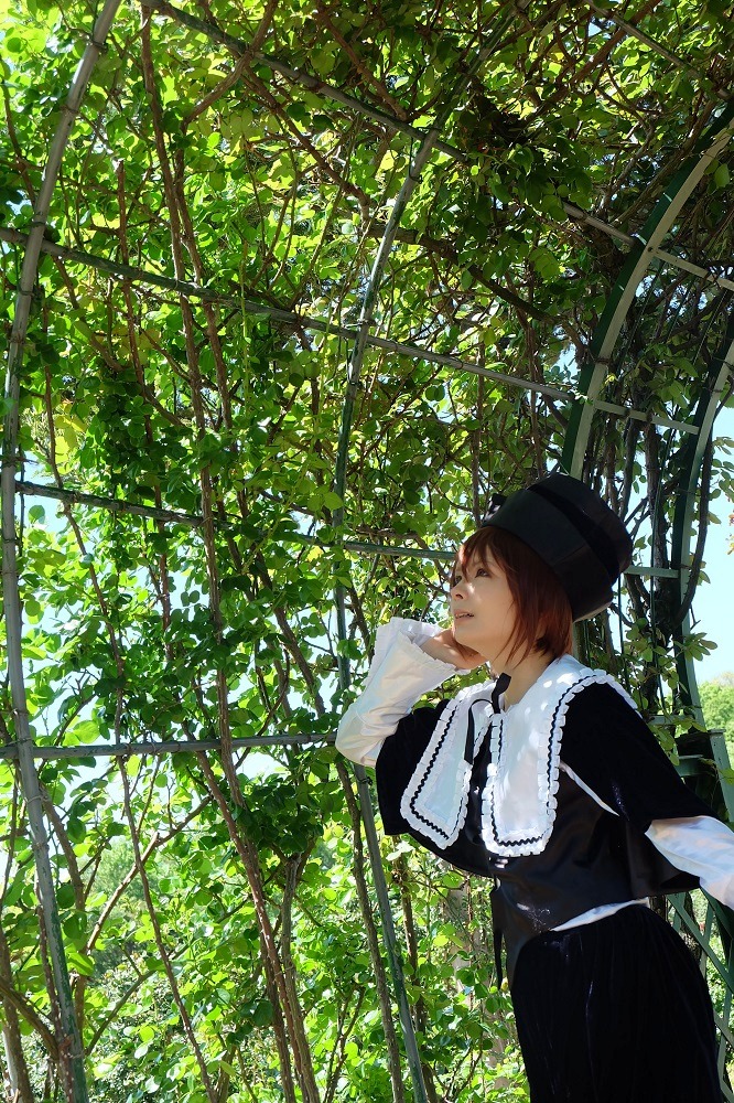 1girl brown_eyes brown_hair dappled_sunlight day hat lips nature outdoors realistic short_hair solo souseiseki sunlight tree
