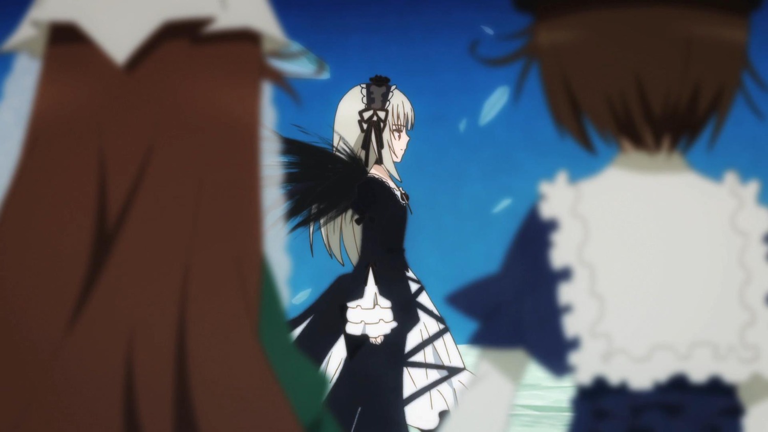 2girls black_dress black_wings blurry blurry_background blurry_foreground depth_of_field dress frills hairband image long_hair long_sleeves looking_at_another motion_blur multiple multiple_girls suigintou tagme wings