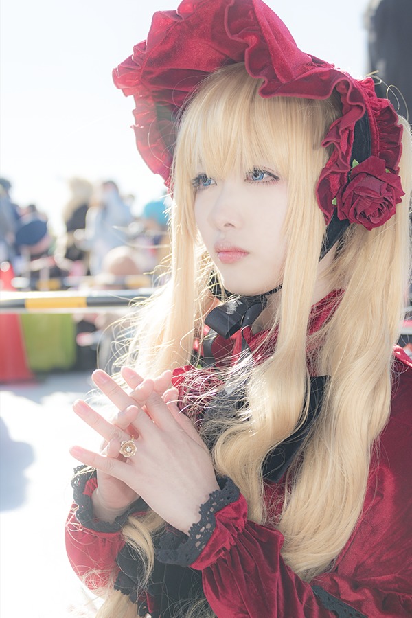 1girl bangs blonde_hair blue_eyes blurry blurry_background blurry_foreground depth_of_field flower hat jewelry lace lips long_hair long_sleeves photo red_dress ring rose shinku solo upper_body