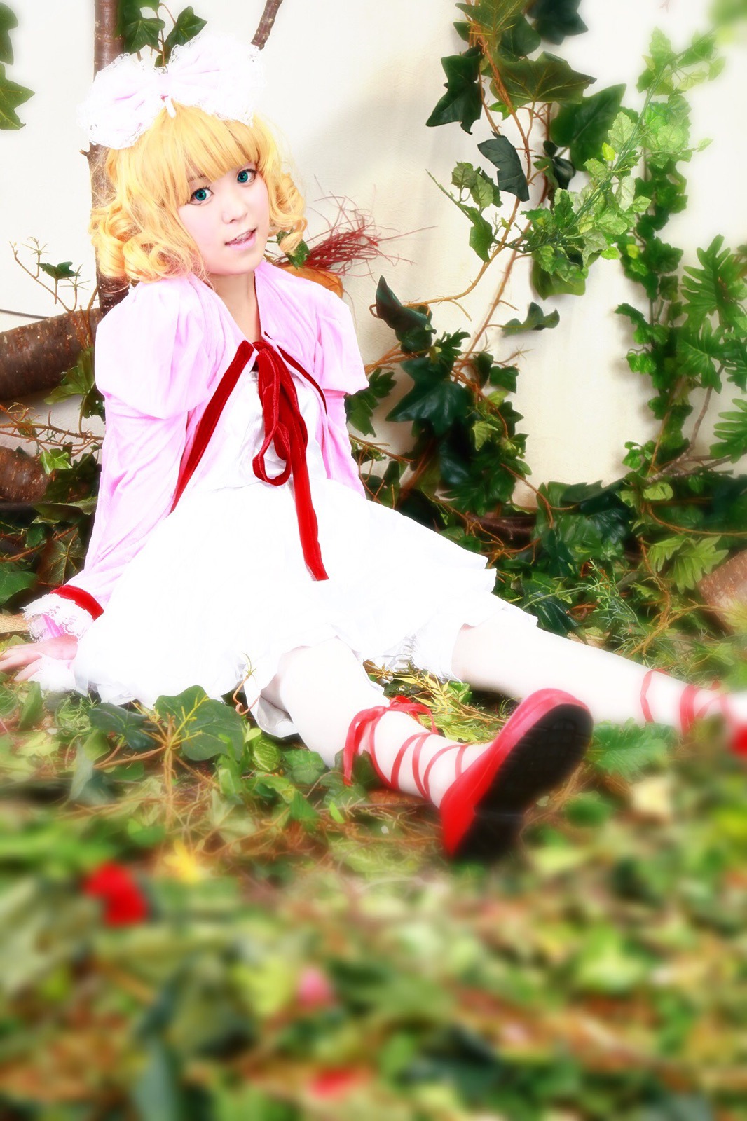 1girl bird blonde_hair blurry blurry_foreground bug butterfly depth_of_field dress flower grass hinaichigo insect lips photo ribbon shoes short_hair sitting solo