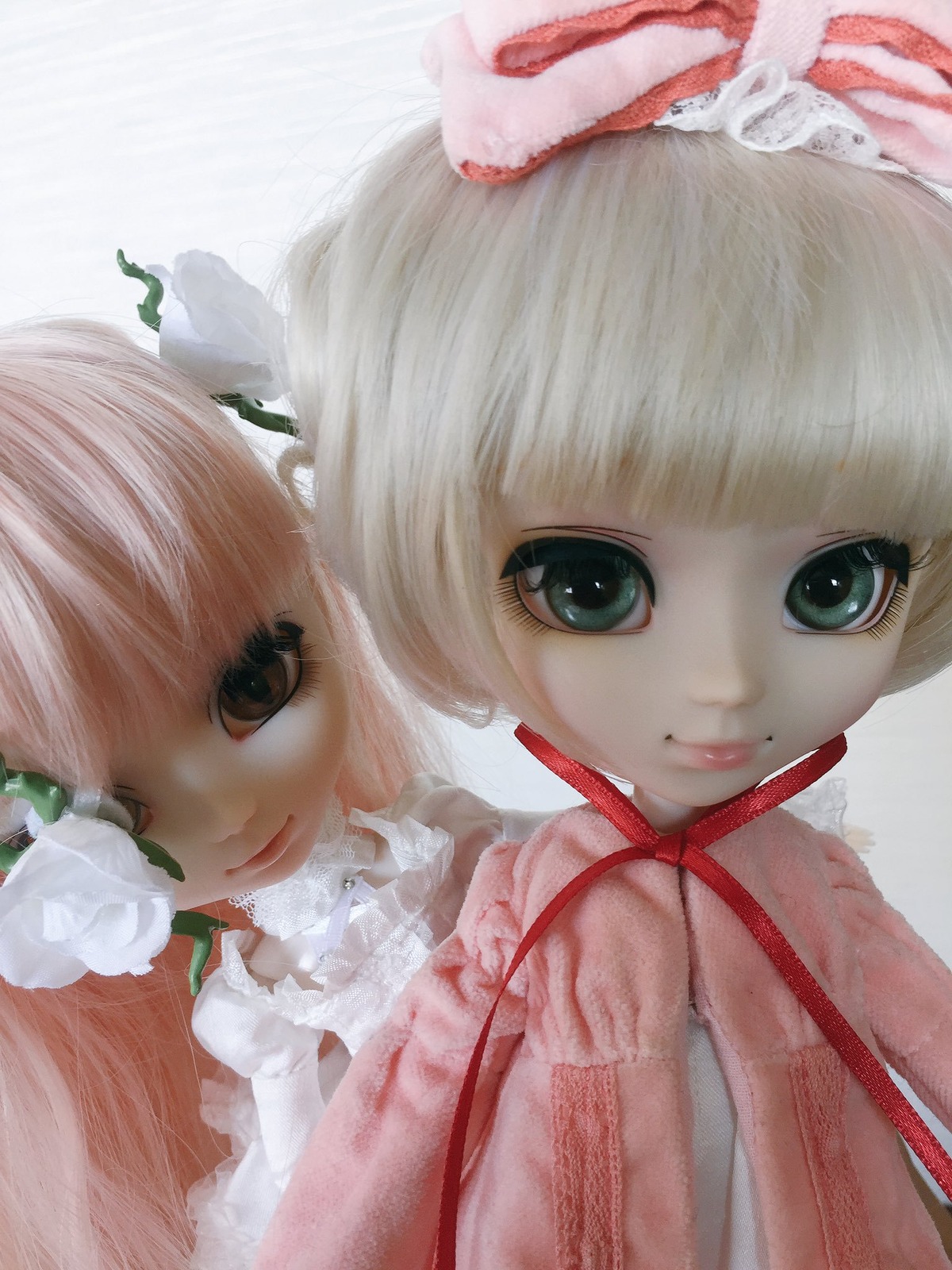 2girls bangs blonde_hair bow doll flower lips looking_at_viewer multiple_dolls multiple_girls ribbon short_hair siblings sisters smile tagme white_hair