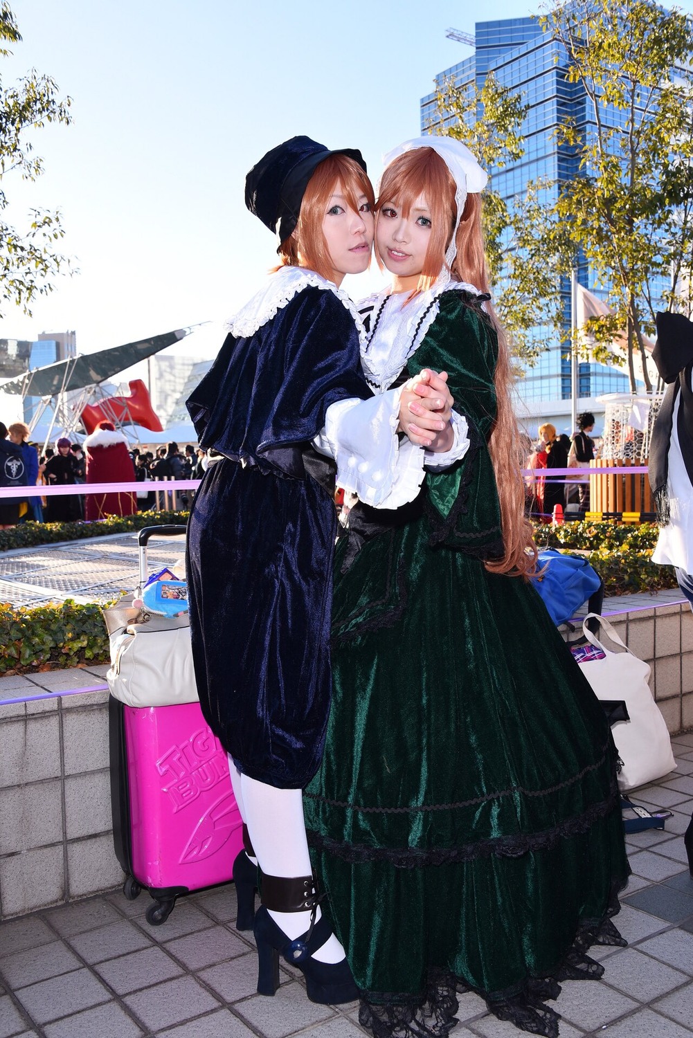 bag black_skirt brown_hair green_eyes hat looking_at_viewer multiple_cosplay multiple_girls outdoors pavement skirt tagme