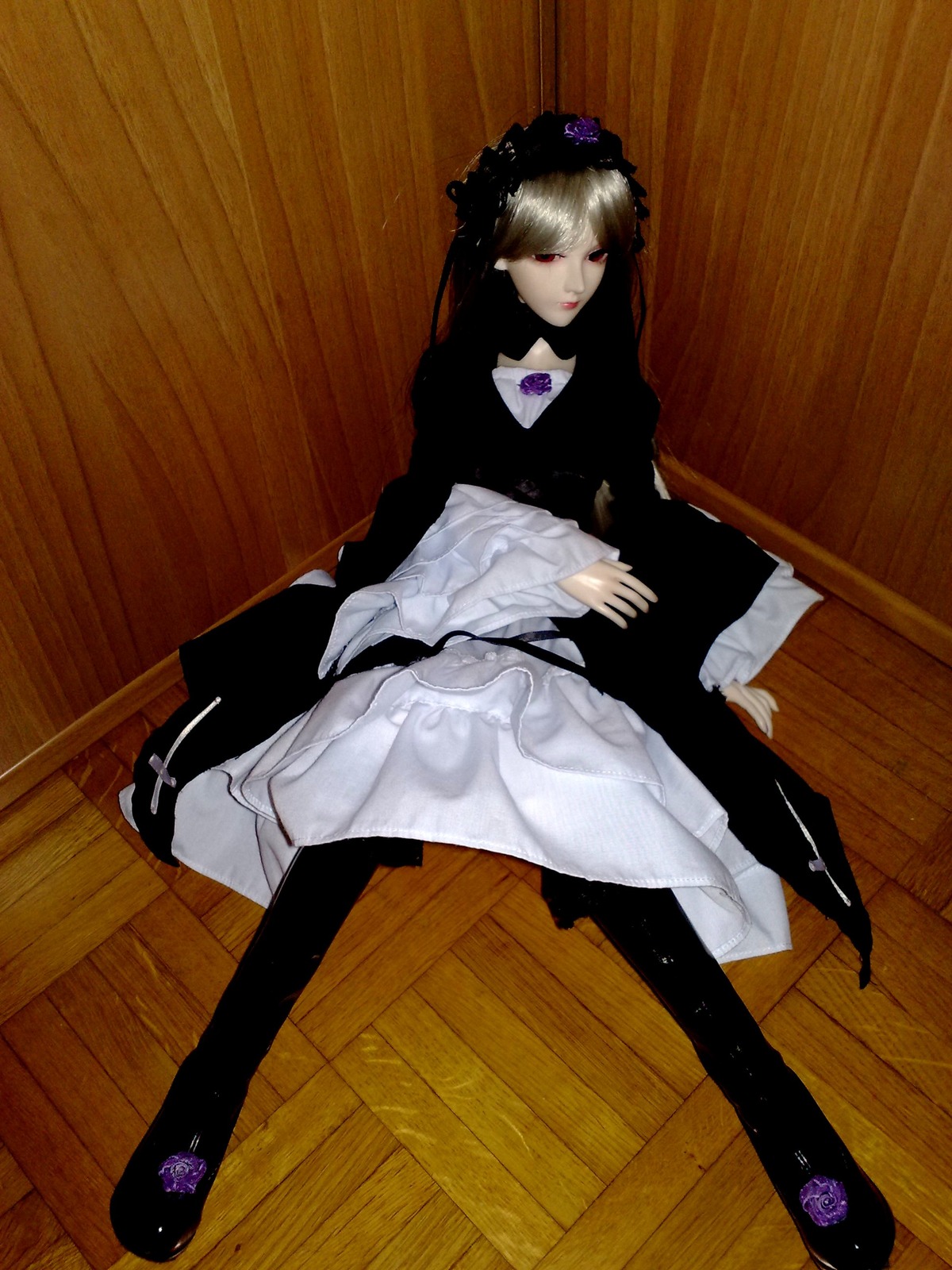 1girl black_legwear doll dress full_body long_sleeves pantyhose red_eyes sitting solo suigintou wooden_floor