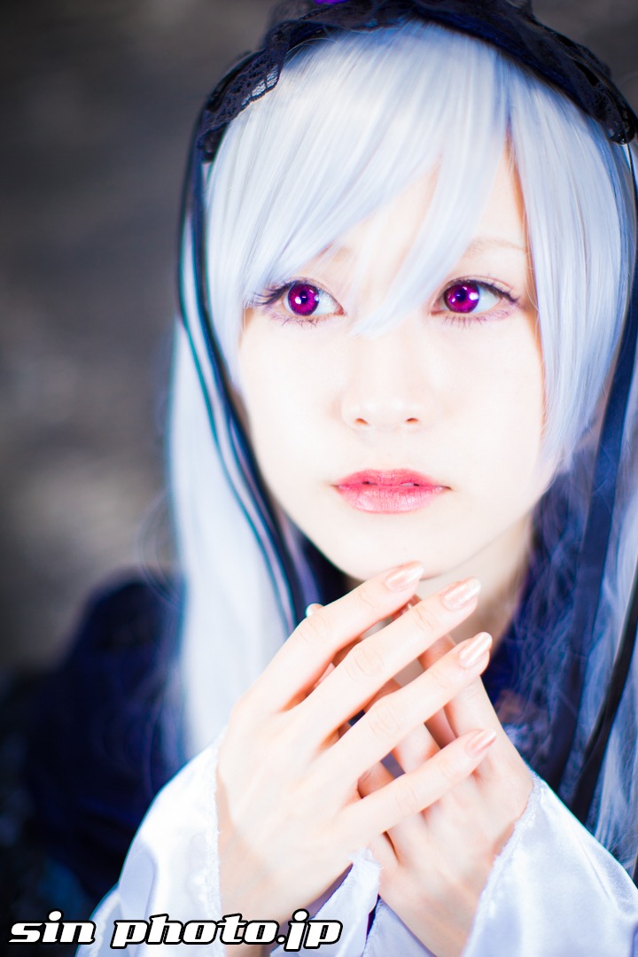 1girl bangs blurry blurry_background closed_mouth depth_of_field hairband hands_together lips looking_at_viewer purple_eyes silver_hair solo suigintou