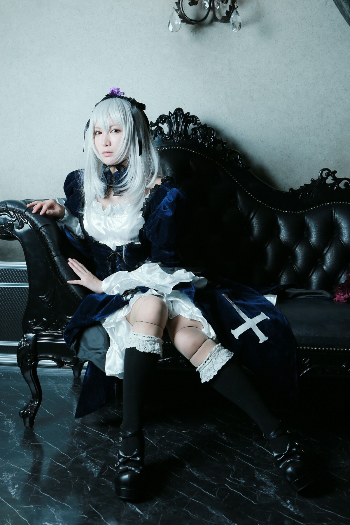 1girl boots chair dress flower frills gothic_lolita lips lolita_fashion long_hair silver_hair sitting solo suigintou thighhighs