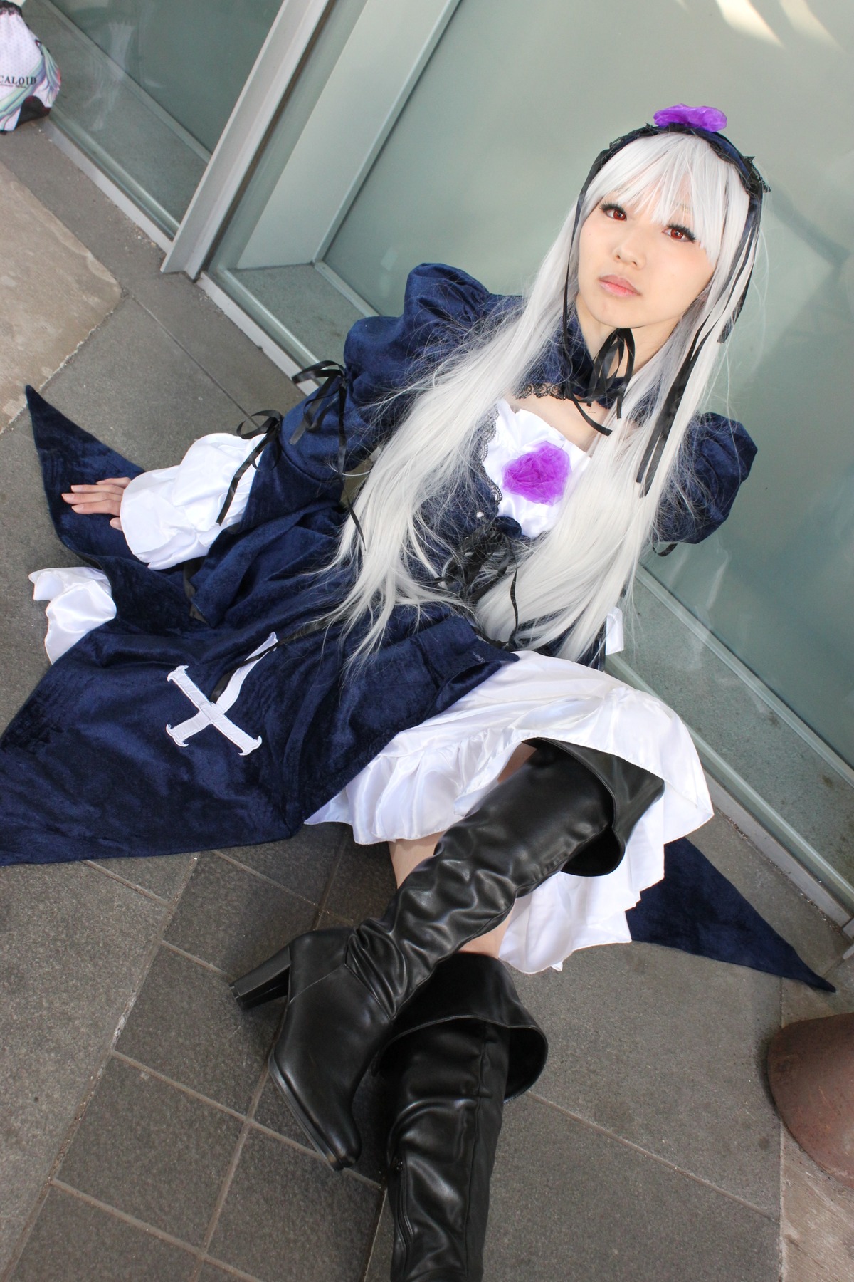 1girl boots choker dress frills hairband long_hair long_sleeves photo red_eyes silver_hair sitting solo suigintou tile_floor