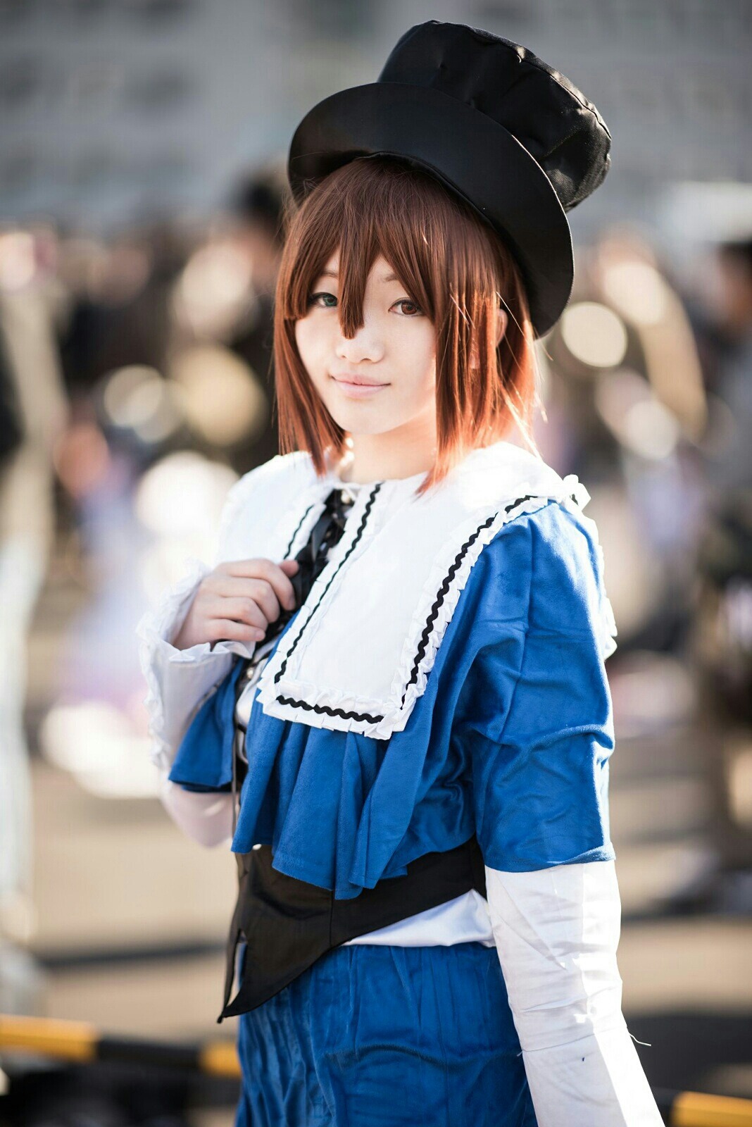 1girl blurry blurry_background brown_eyes brown_hair denim depth_of_field hat long_sleeves looking_at_viewer outdoors photo short_hair smile solo souseiseki