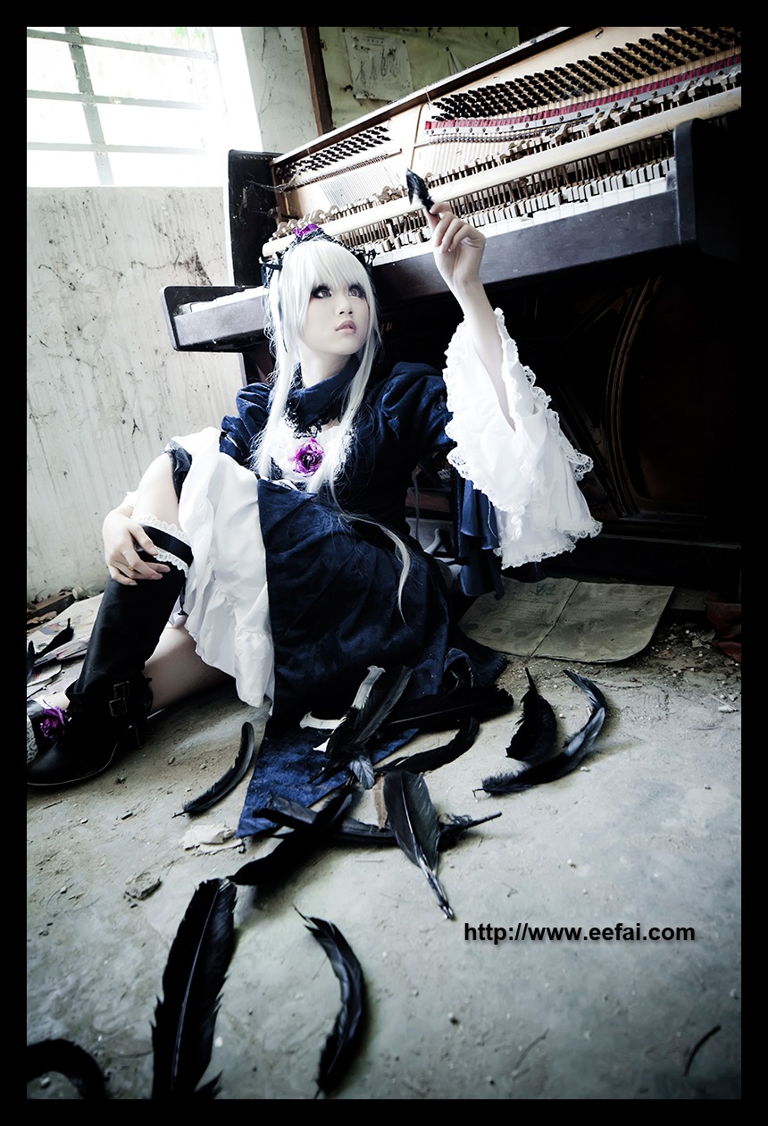 1girl auto_tagged bird feathers hair_ornament letterboxed long_hair sitting solo suigintou white_hair