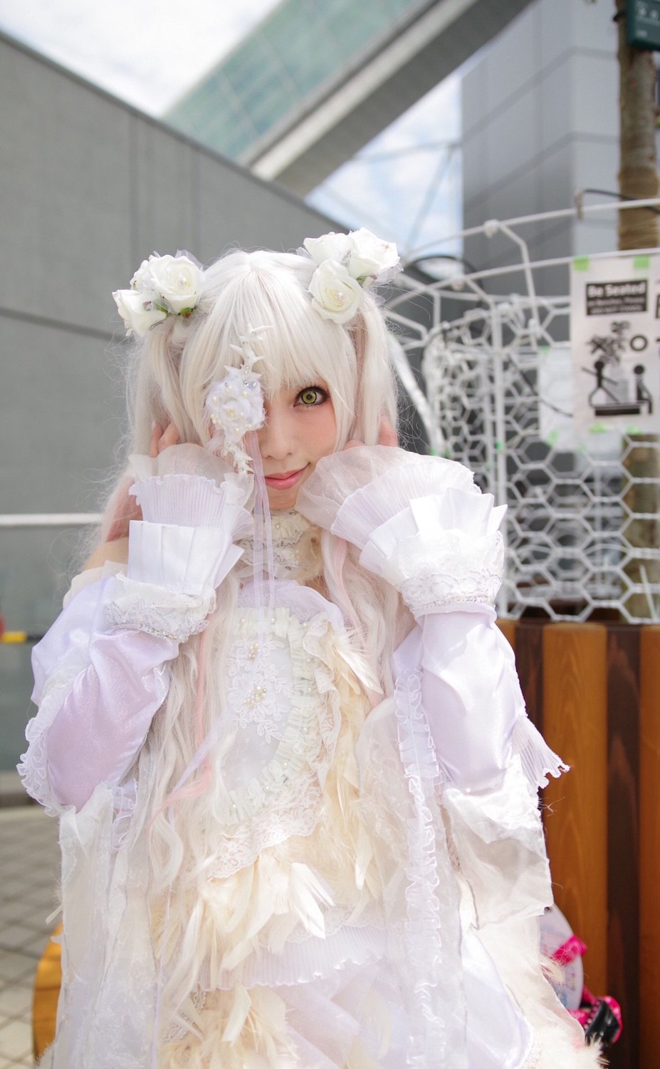 1girl blurry depth_of_field dress eyepatch flower frills green_eyes hair_flower hair_ornament kirakishou photo see-through solo white_dress white_flower