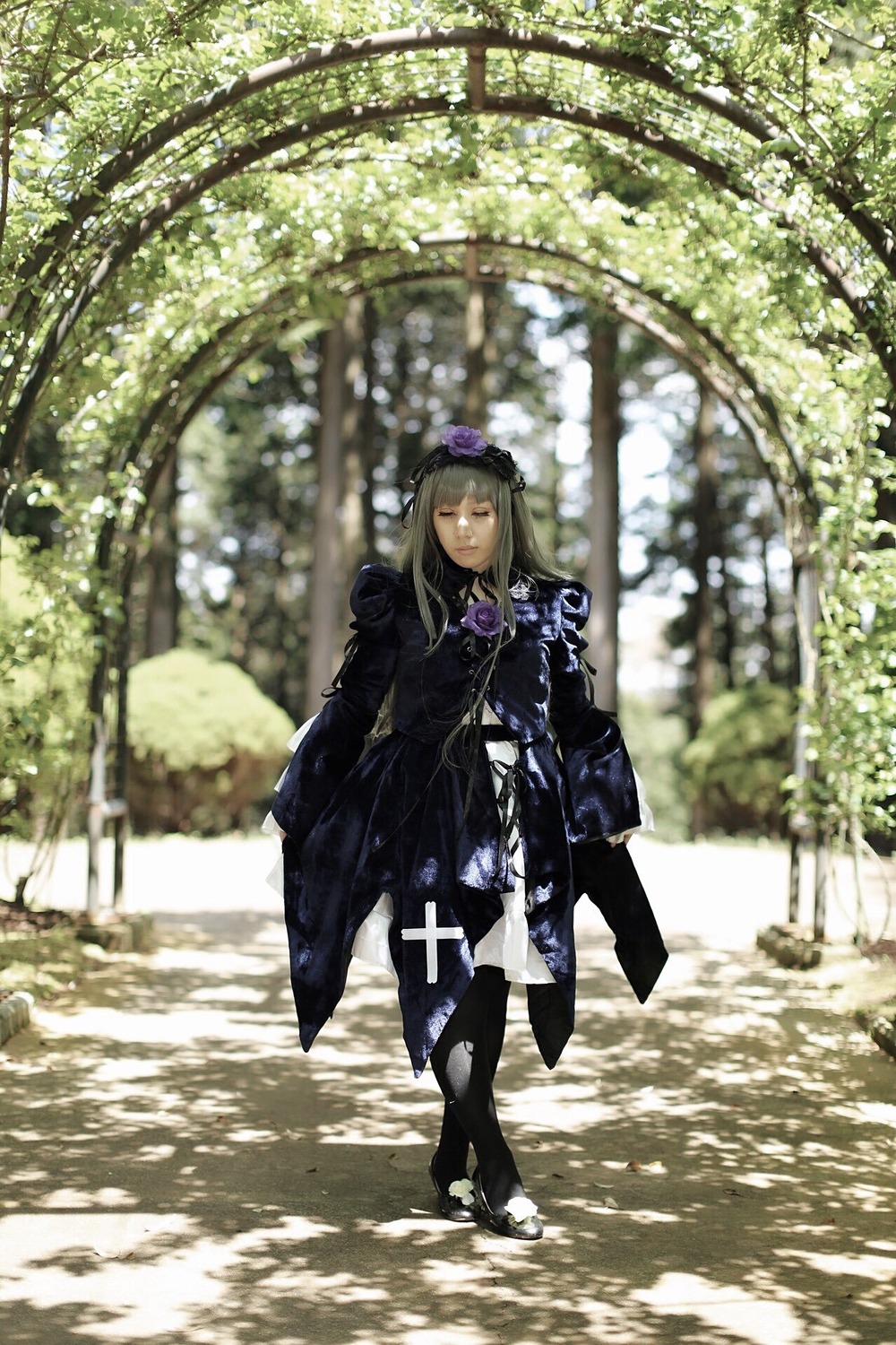 1girl blurry closed_eyes depth_of_field dress long_hair outdoors solo standing suigintou tree walking