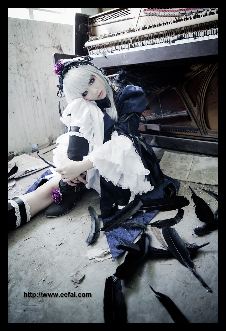 1girl dress frills gothic_lolita letterboxed lolita_fashion long_sleeves silver_hair sitting solo suigintou weapon