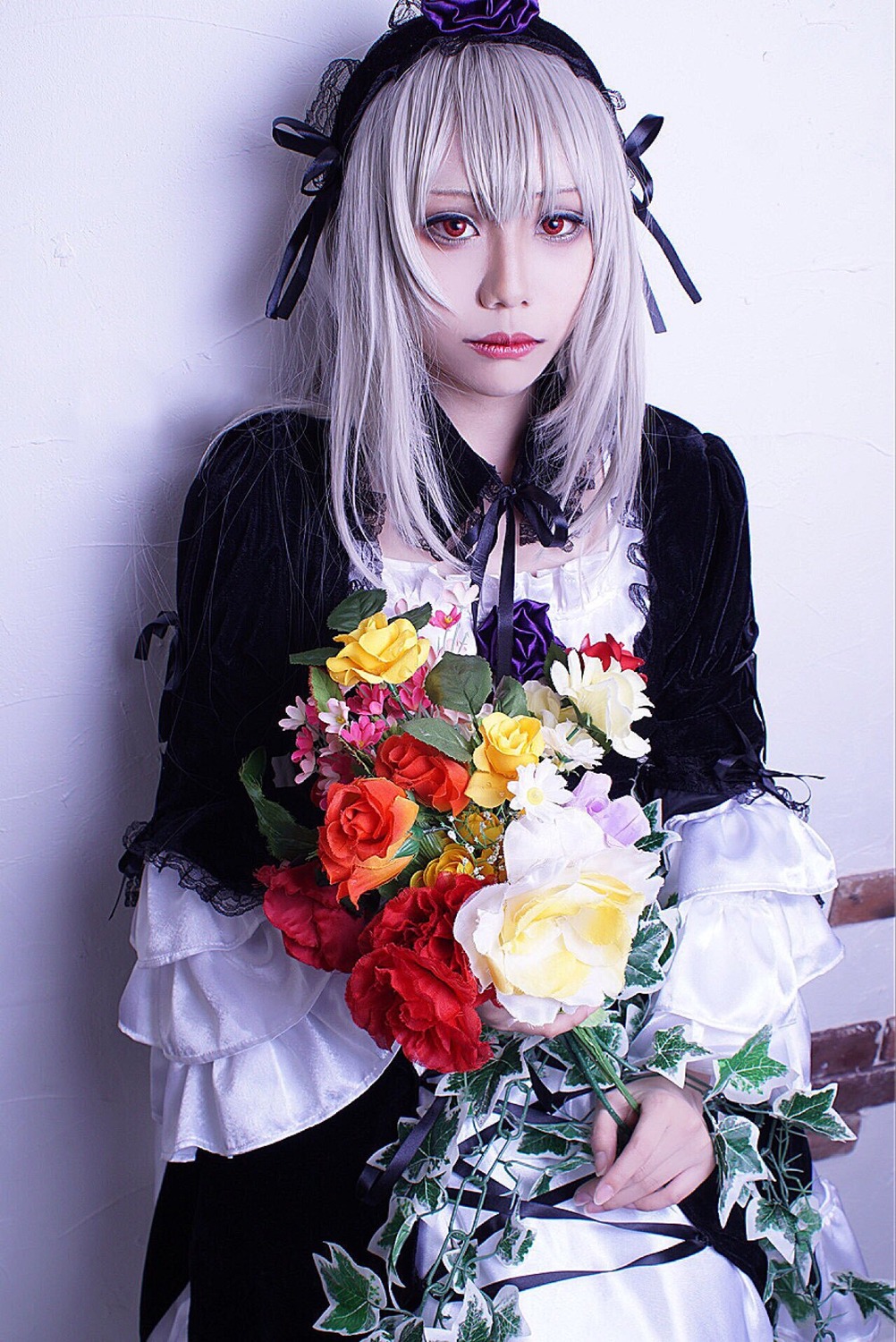 1girl bouquet dress flower hairband lips long_hair long_sleeves looking_at_viewer rain red_eyes ribbon rose silver_hair solo suigintou