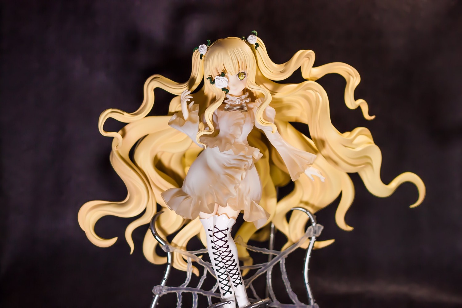 1girl blonde_hair boots cross-laced_footwear doll dress hair_ornament kirakishou long_hair see-through solo very_long_hair yellow_eyes