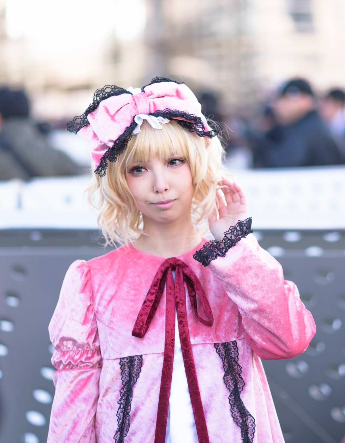 1girl blonde_hair blurry blurry_background blurry_foreground bow depth_of_field dress hair_bow hairband hinaichigo lips lolita_hairband long_sleeves looking_at_viewer photo realistic ribbon short_hair solo upper_body