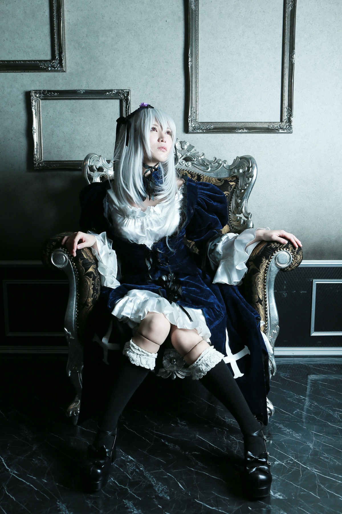 1girl boots crossed_legs dress gothic_lolita lolita_fashion long_hair sitting solo suigintou thighhighs