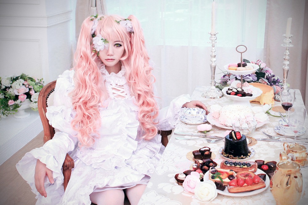 cake dress flower food fruit hair_ornament kirakishou long_hair pink_hair solo strawberry twintails