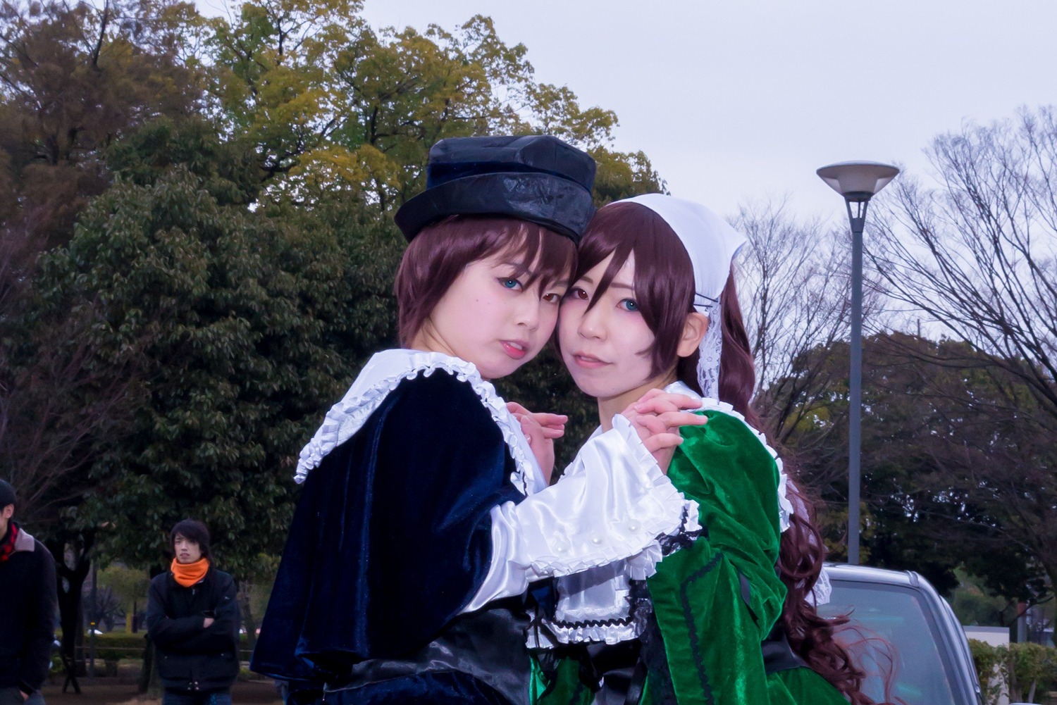 2girls blue_eyes brown_hair hat hug lips looking_at_viewer multiple_cosplay multiple_girls nature outdoors realistic short_hair suiseiseki tagme tree